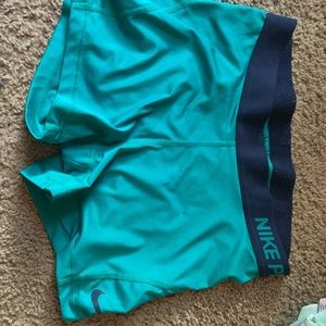 Teal Nike pros size L